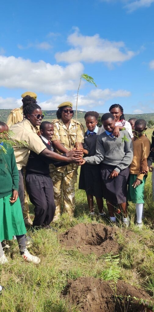 Group of students and well wishers planting trees in Lukenya wildlifeconservancy